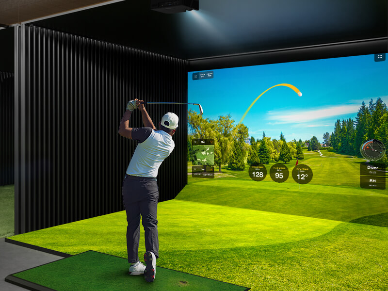 A golf simulator room with a realism look and feel to golfing. 