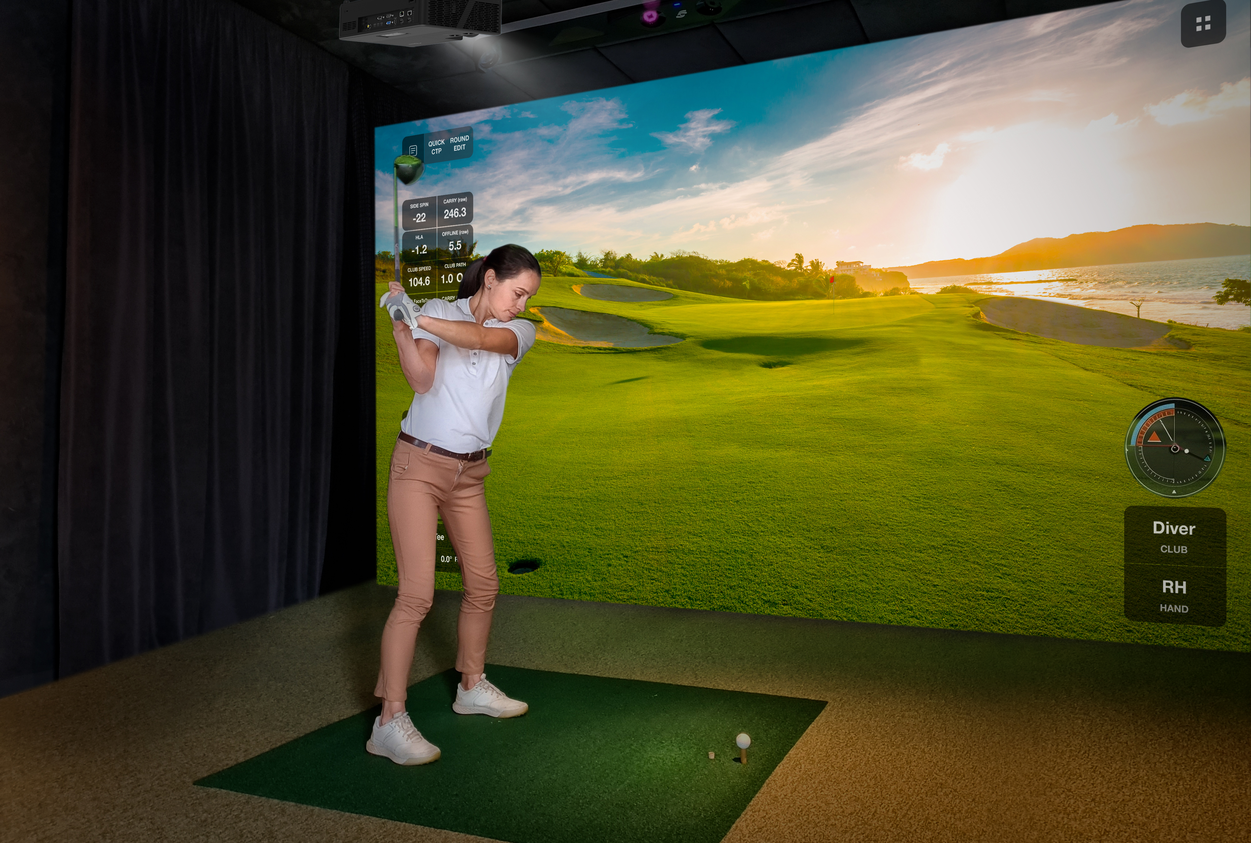 Female golfer swinging a golf club in immersive golf setup