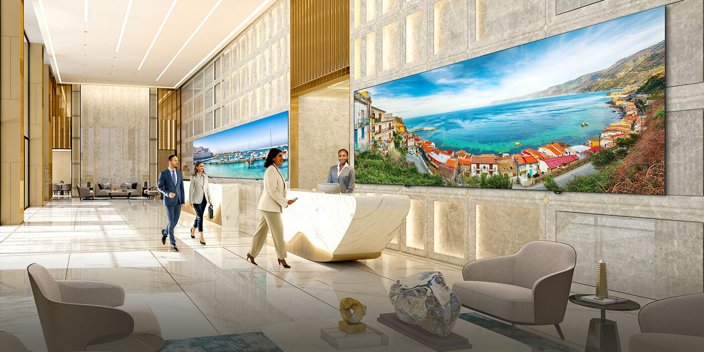 Transform your hospitality space with seamless curved LED video walls featuring ultra-high resolution Mediterranean coastal displays. This premium digital signage solution combines immersive visual technology with elegant marble reception design, perfect for luxury hotels, corporate lobbies, and high-end commercial spaces. The wraparound LED display creates stunning visual experiences while guests check in, enhancing brand presence and customer engagement. Professional installation delivers crystal-clear imagery across multiple curved panels, ideal for hospitality digital transformation, corporate branding displays, and interactive customer experiences in upscale reception environments.