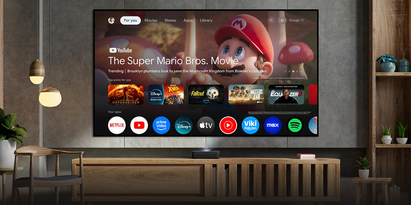 Large smart TV displaying streaming apps and Super Mario Bros Movie on modern entertainment center