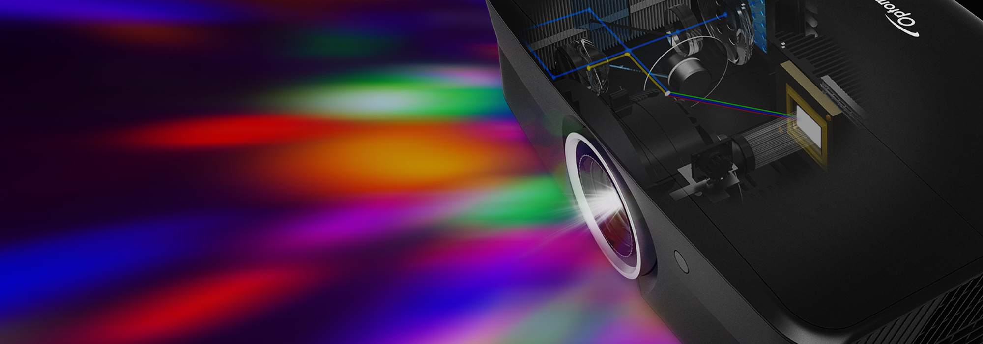 Close-up of a high-performance projector with visible internal optical components projecting vibrant RGB light spectrum, showcasing advanced display technology and color accuracy