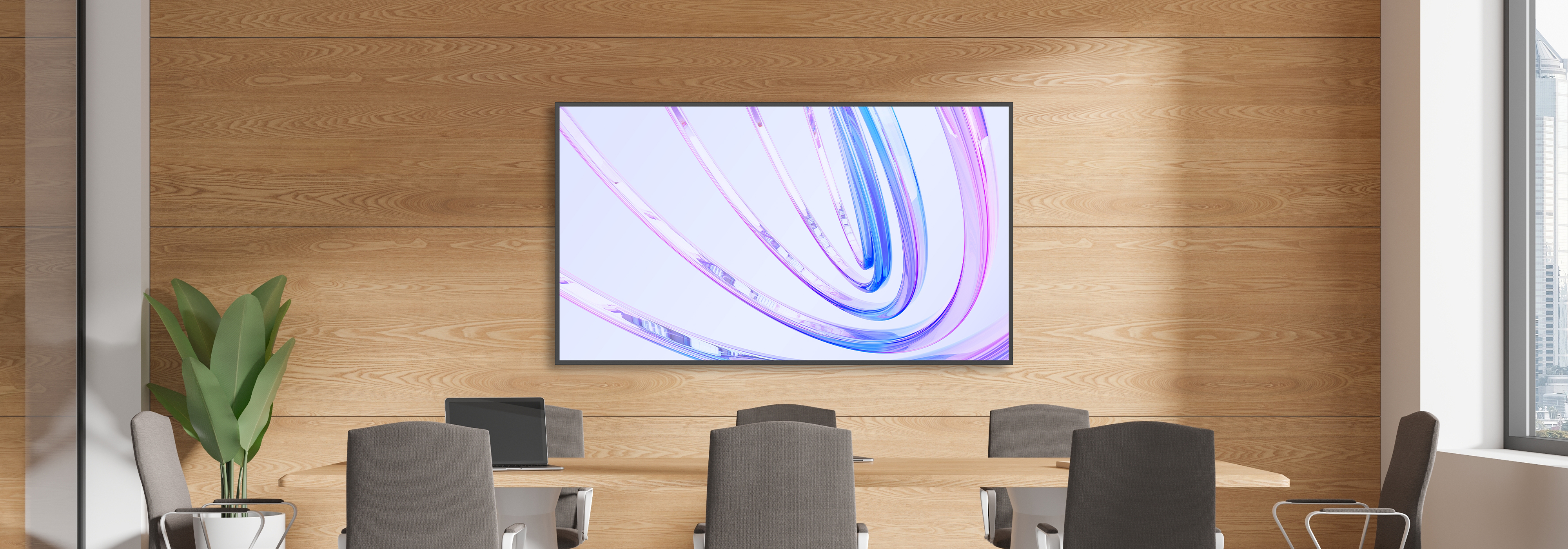 Conference room with Optoma N3652K flat panel display mounted on a wooden wall above meeting tables